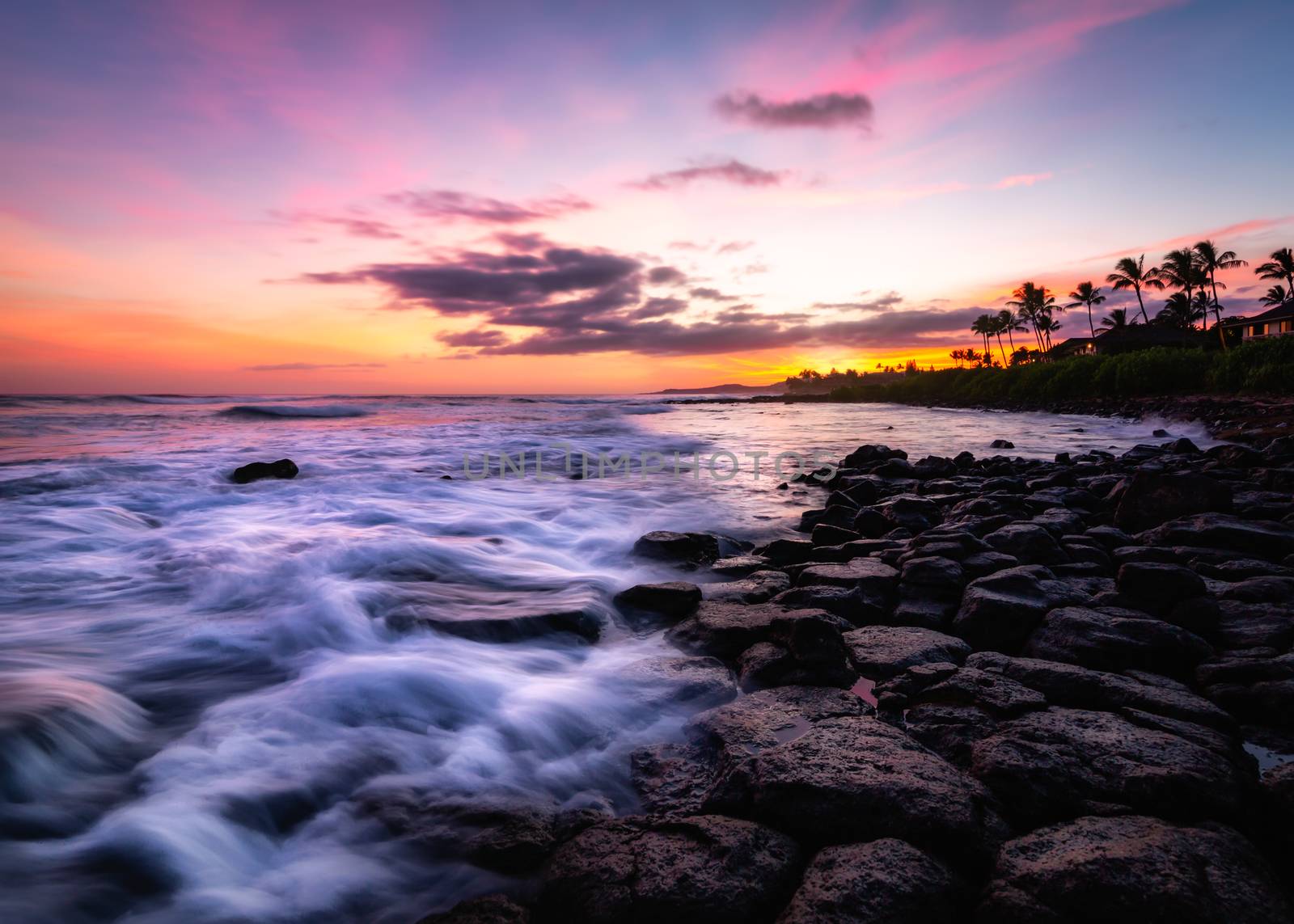 Evening Sunset at a Tropical Rocky Beach by backyard_photography