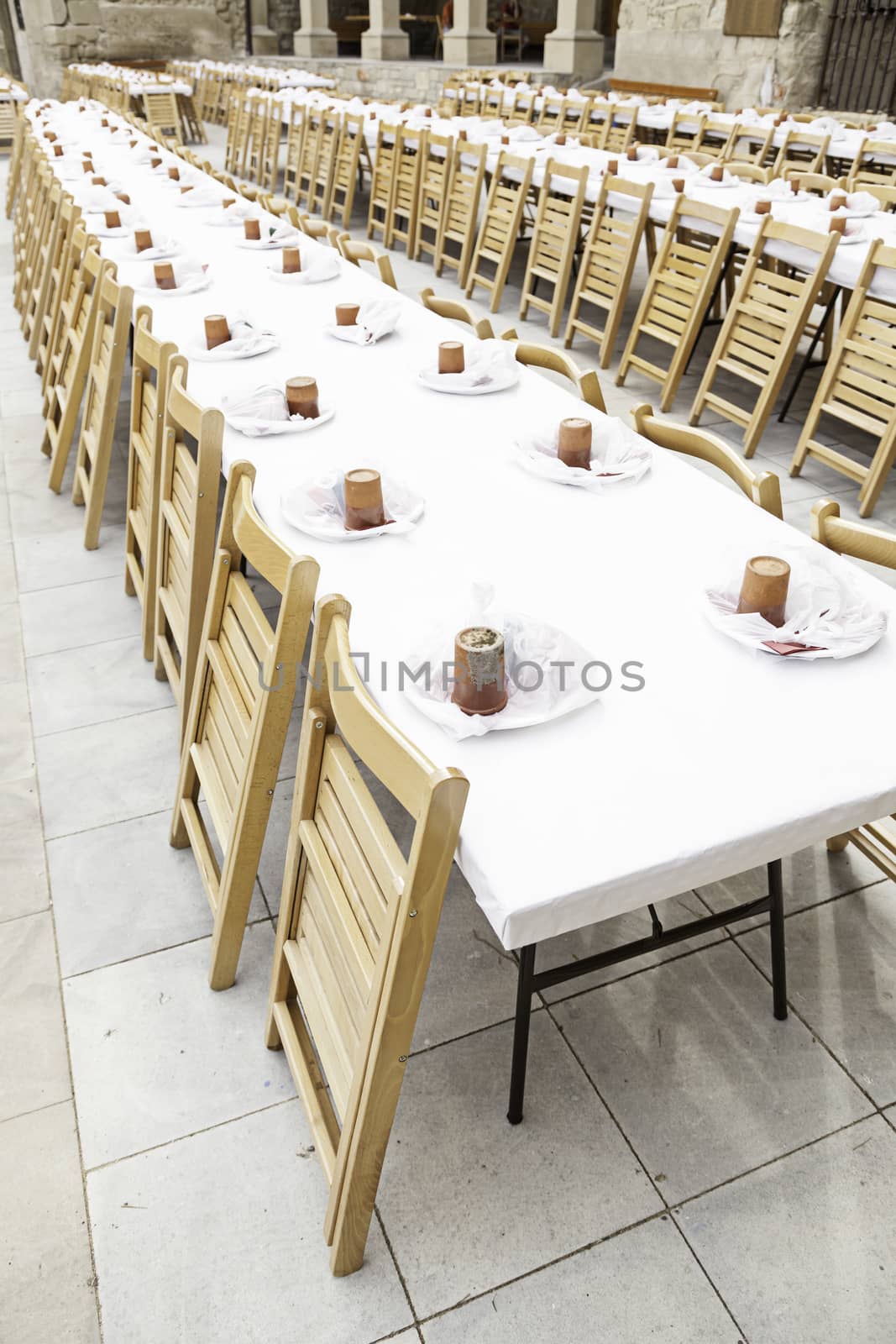 Large dining table, detail of a table at a popular food in town, lots of it