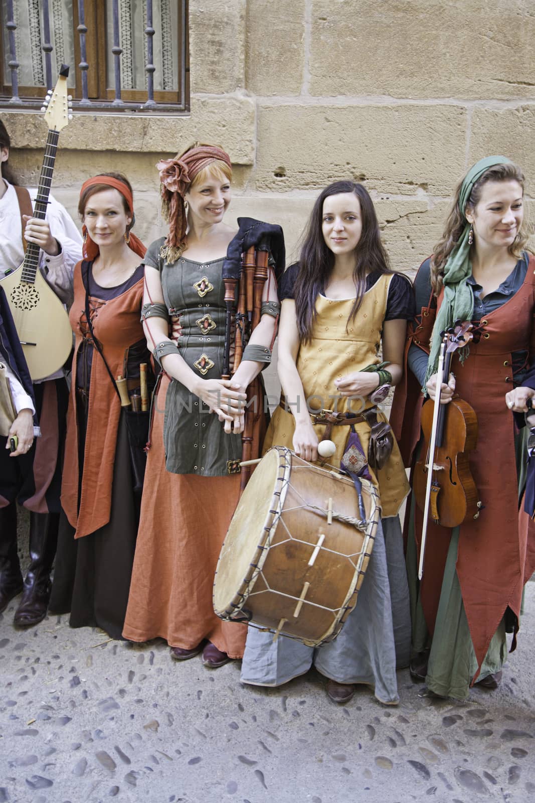 Group medieval musicians, detail of a group of beautiful women who play ancient music