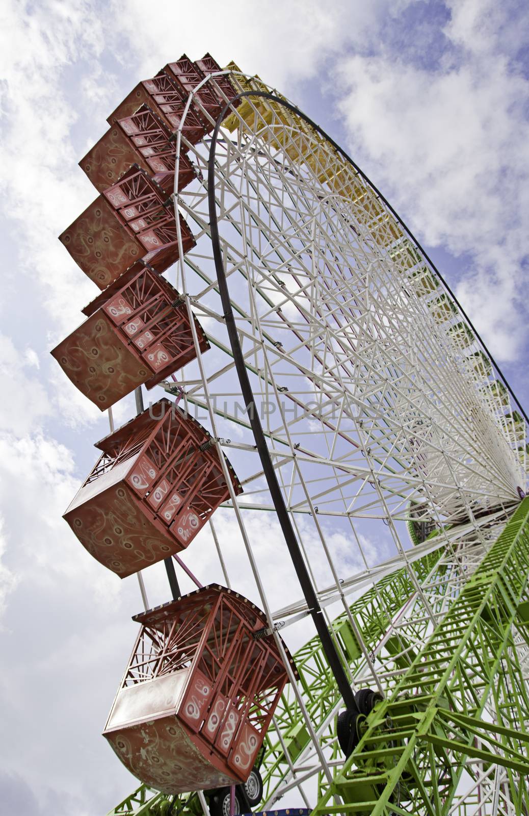 Ferris wheel at the fair, fairground attraction detail in the city, diverison