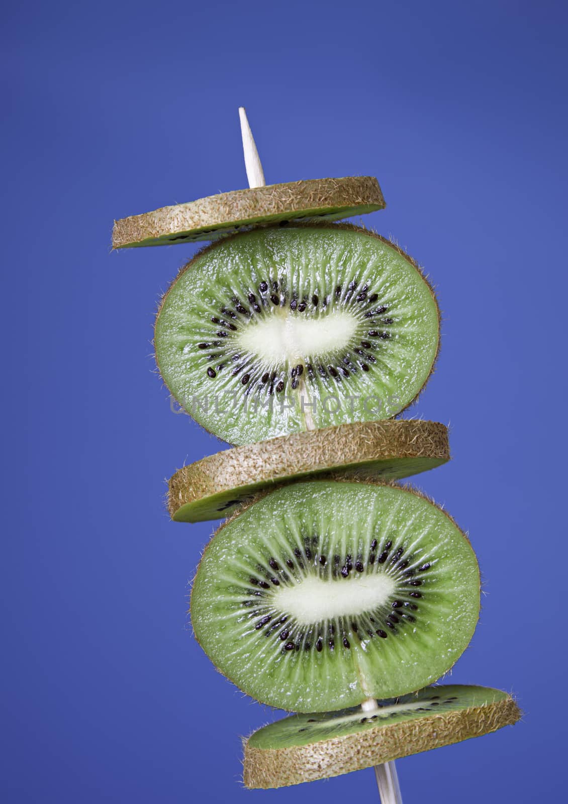 Kiwi sliced ??fruit skewer detail, healthy living food, tropical fruit