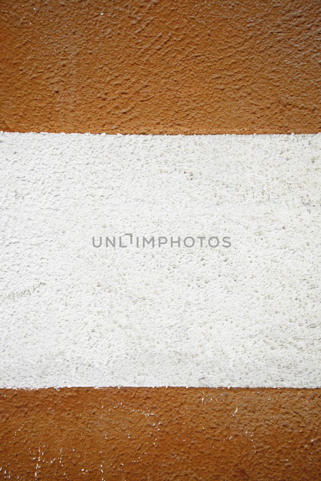 White and red wall, detail of old wall painted red and white facade and construction