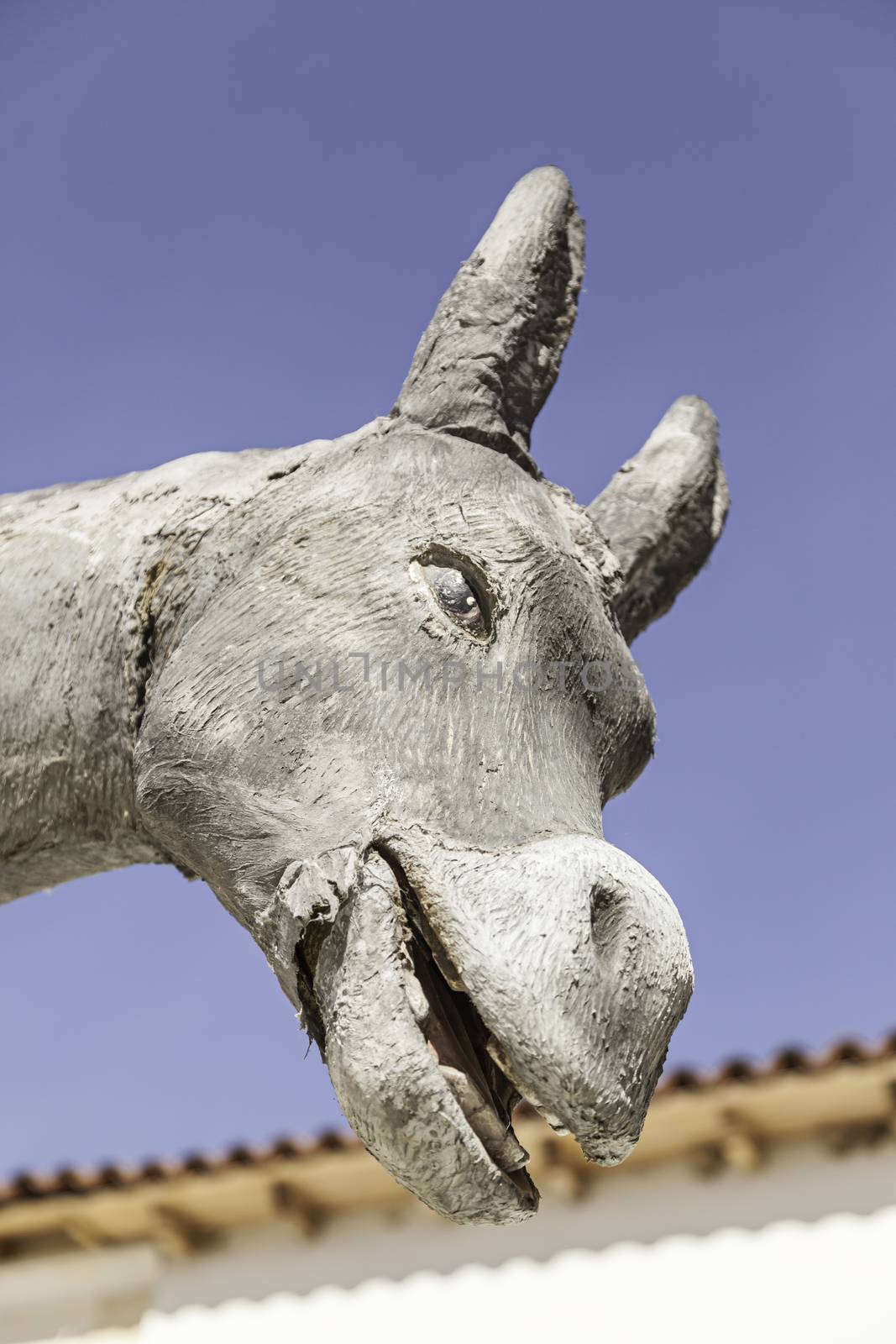 Donkey shaped statue, detail of a figure of a donkey, decoration and fun