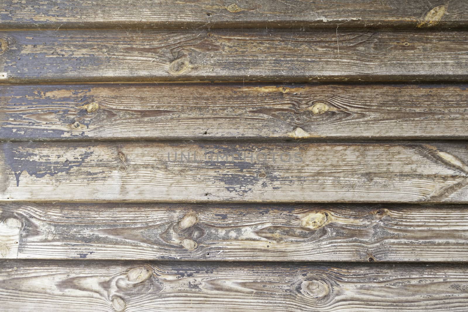 Wooden slats, detail of a wall decorated with wood in the city, wooden textured background