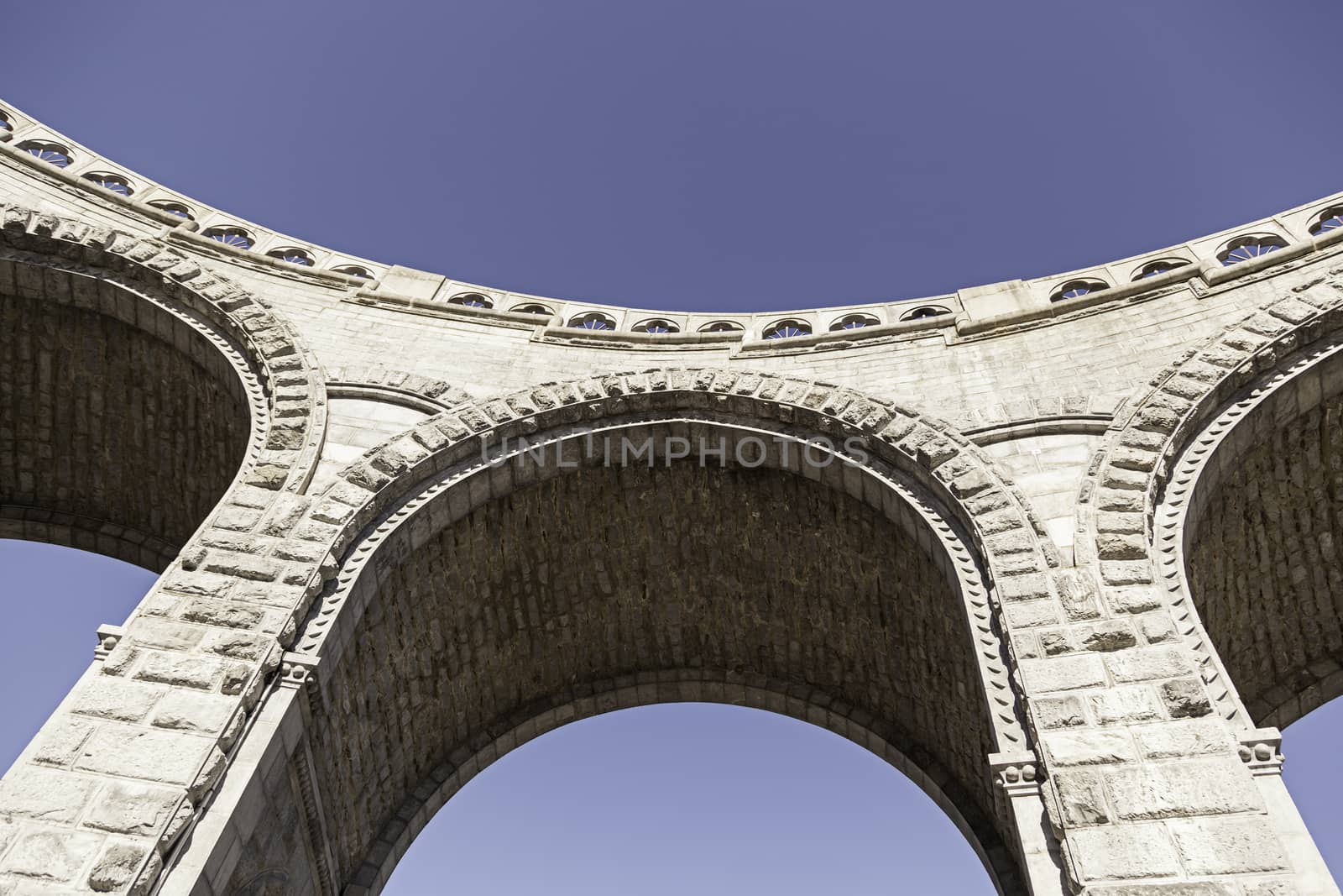 Ancient stone arches, detail of an old building and historic art and architecture