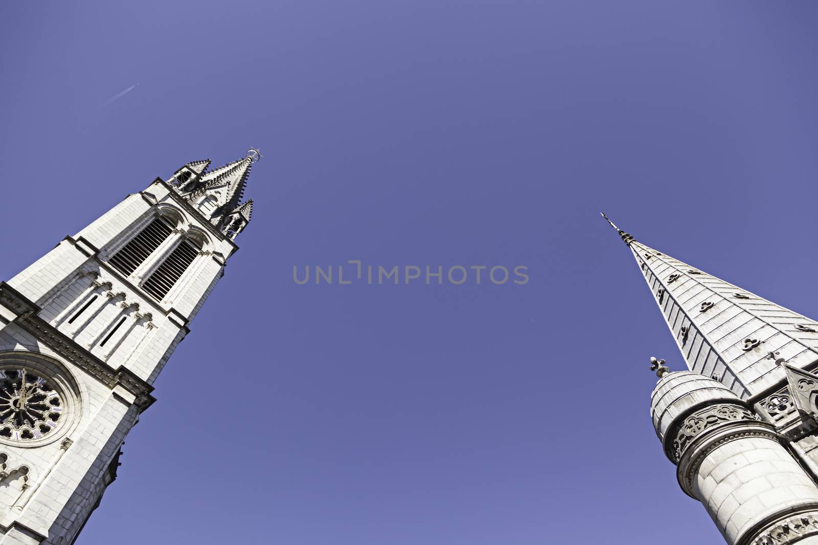 Towers of Lourdes Church, detail of the towers with sky background, historical and religious building