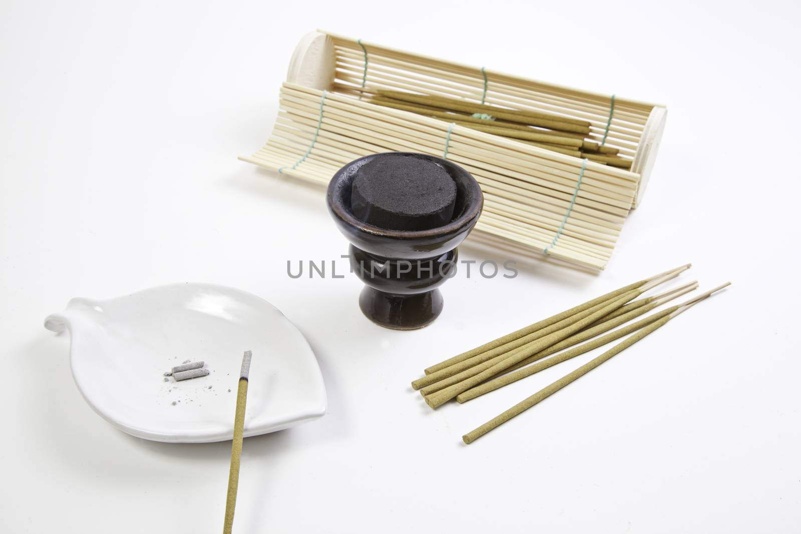 Incense and charcoal in the spa, detail of relaxation at the spa, oriental textured background