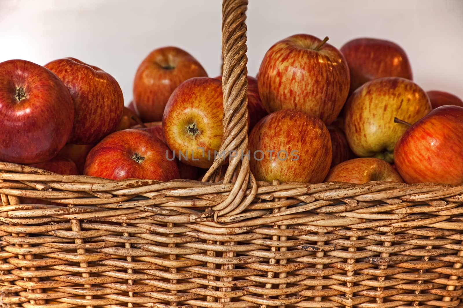 A grass  basket of red Starking apples 3 by kobus_peche