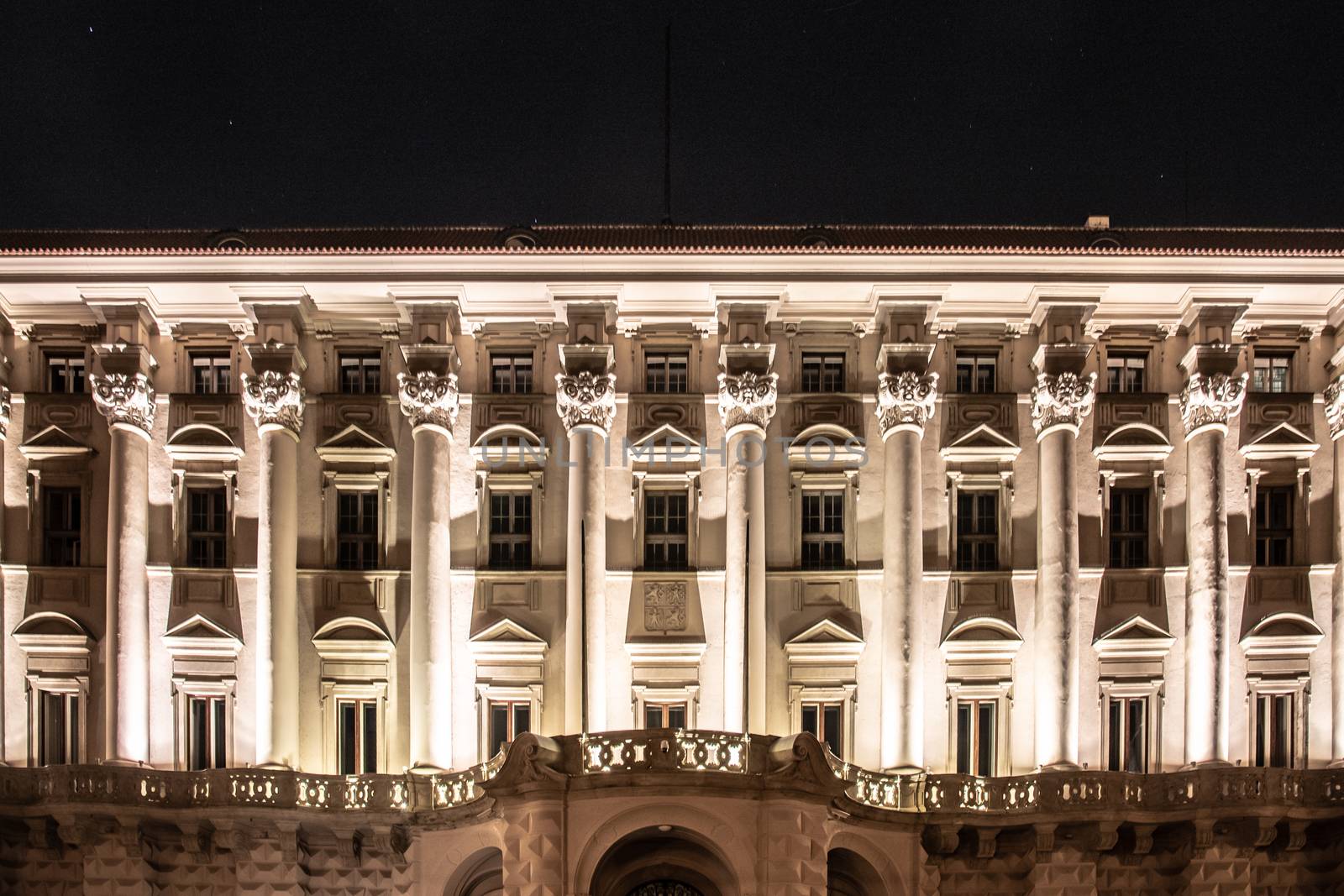 Front view of illuminated Cernin palace by night, Ministry of Foreign Affairs seat, Prague, Czech Republic.