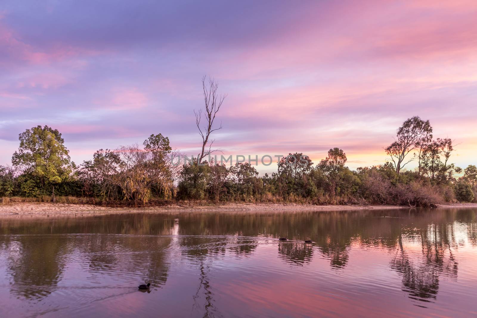 Rural sunrise and reflections in the lake by lovleah