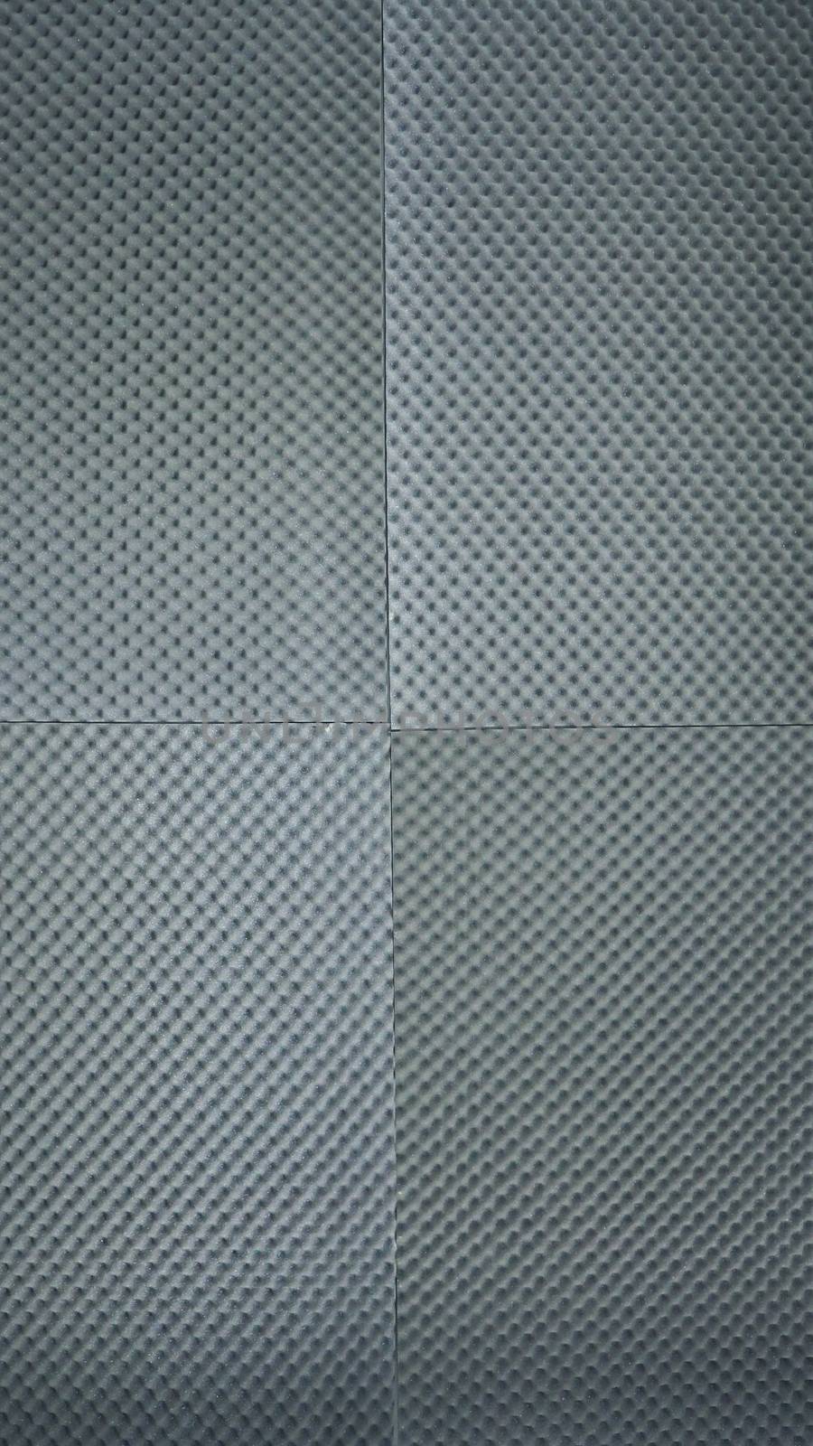 Sound proof acoustic foam on studio wall by gnepphoto