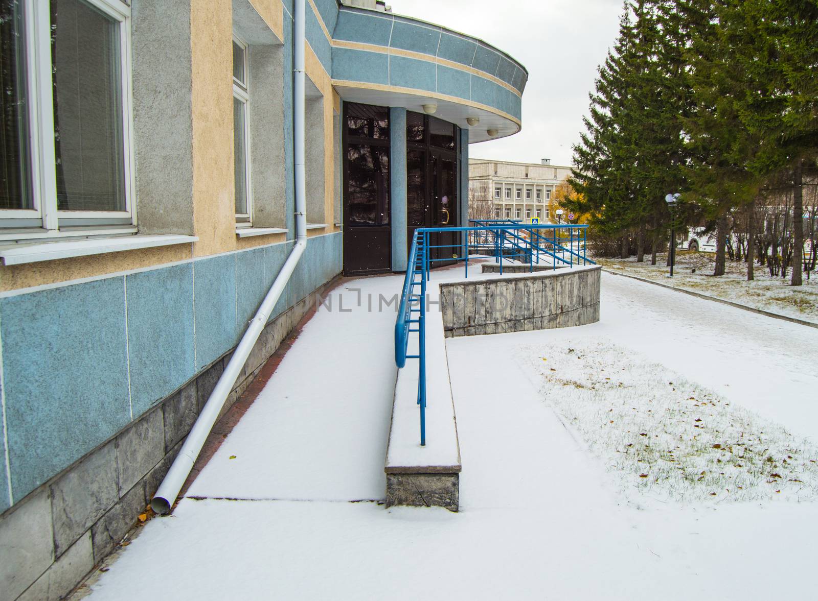 The ramp is covered with the first snow installed for the movement of people with disabilities at any time of the year by claire_lucia