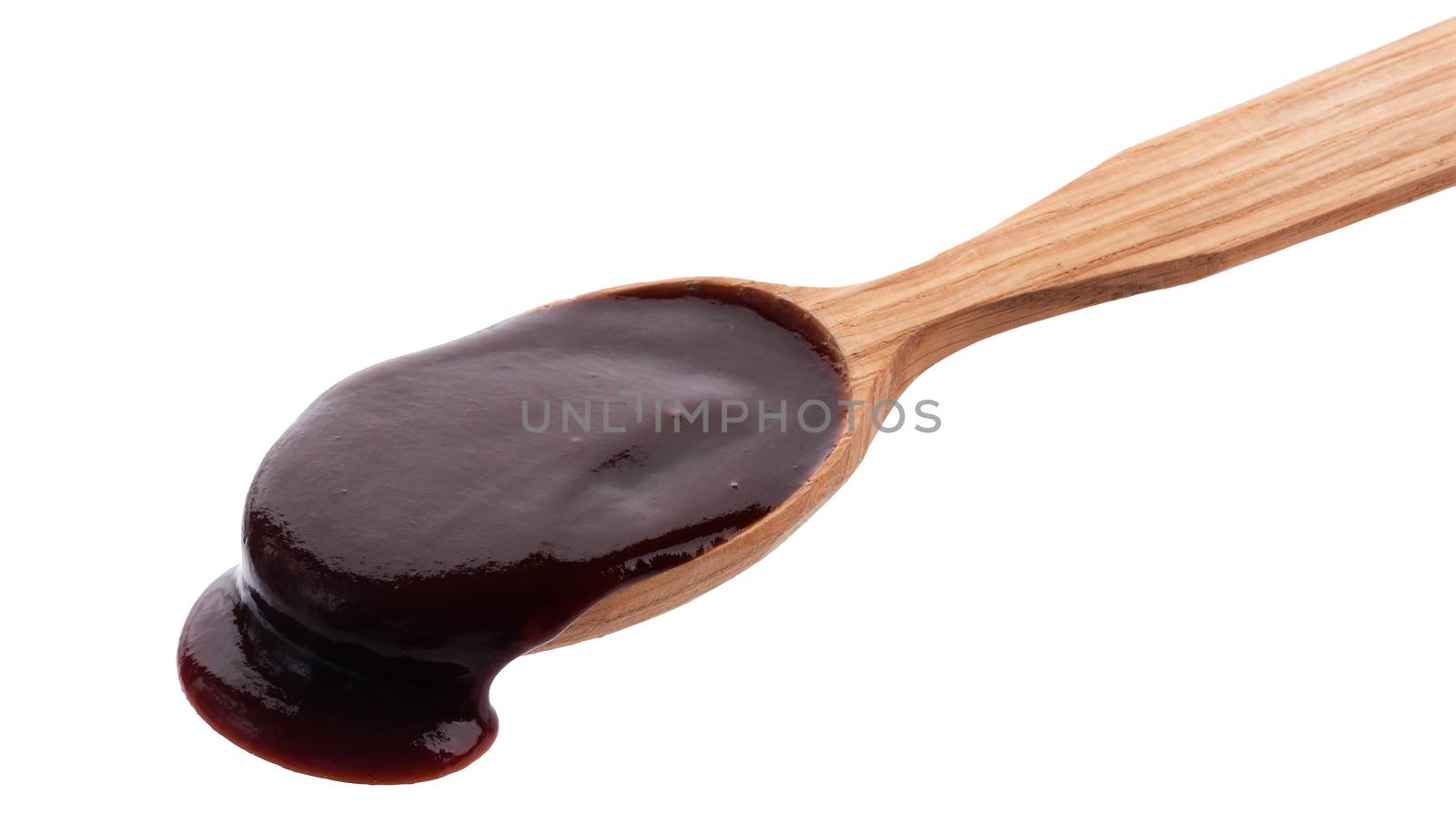 Barbecue sauce with wooden spoon isolated on white background by xamtiw