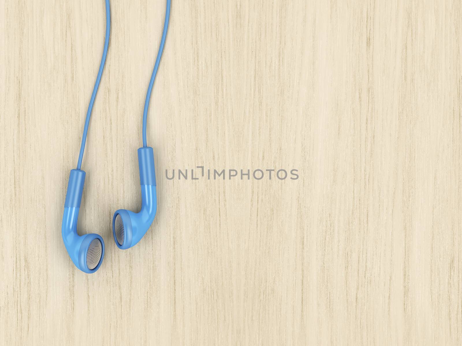 Blue wired earphones on wood background, copy space