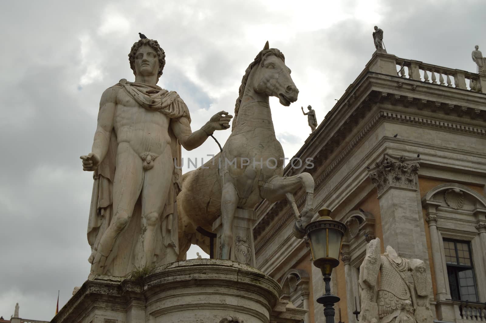 Marble statues of the Dioscuri castor and Pollux at the top of the Capitoline hill and Piazza Campidoglio in Rome, Italy, October 07, 2018.