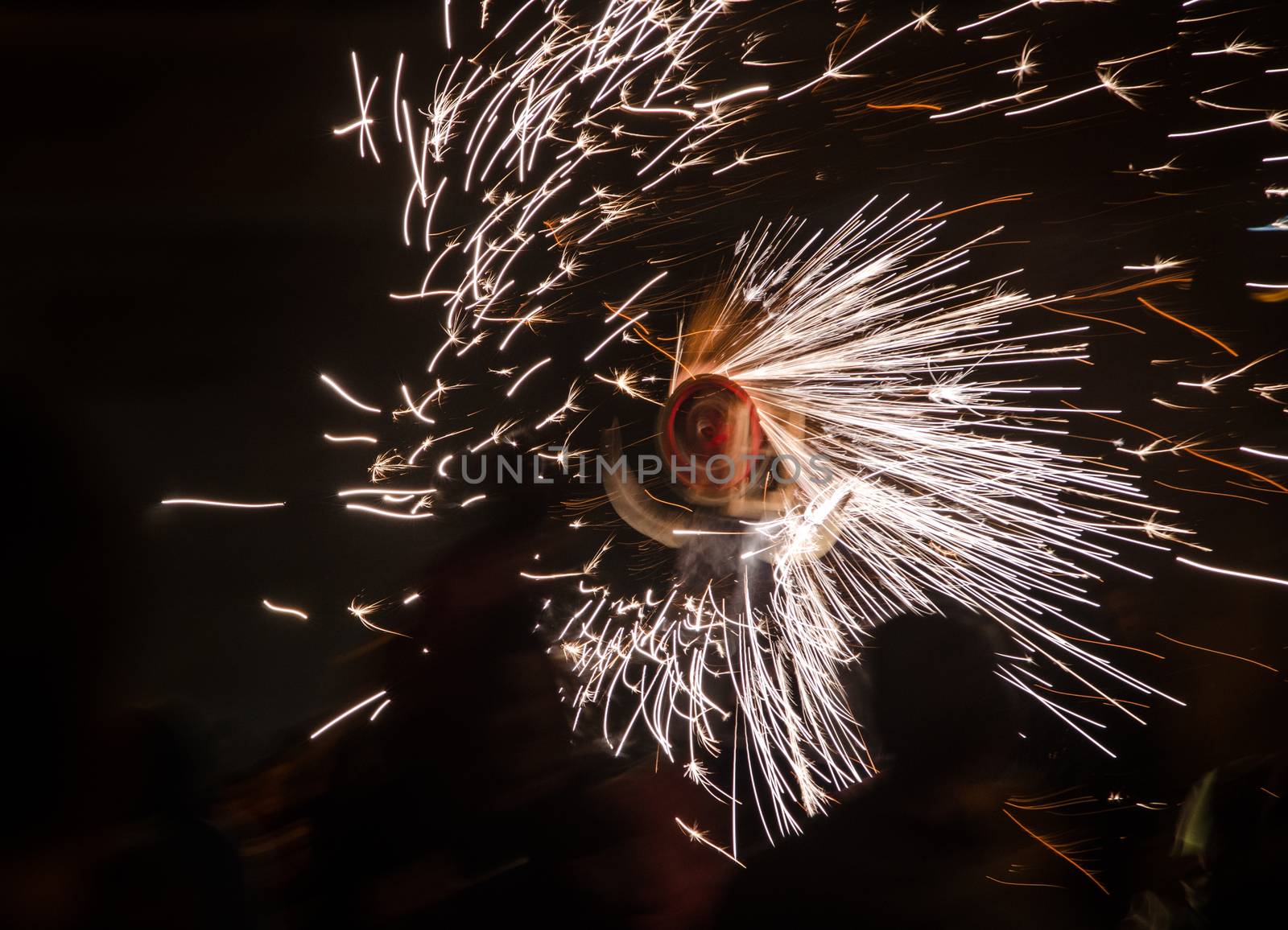 Fireworks roulette on a fake bull spins while sparking