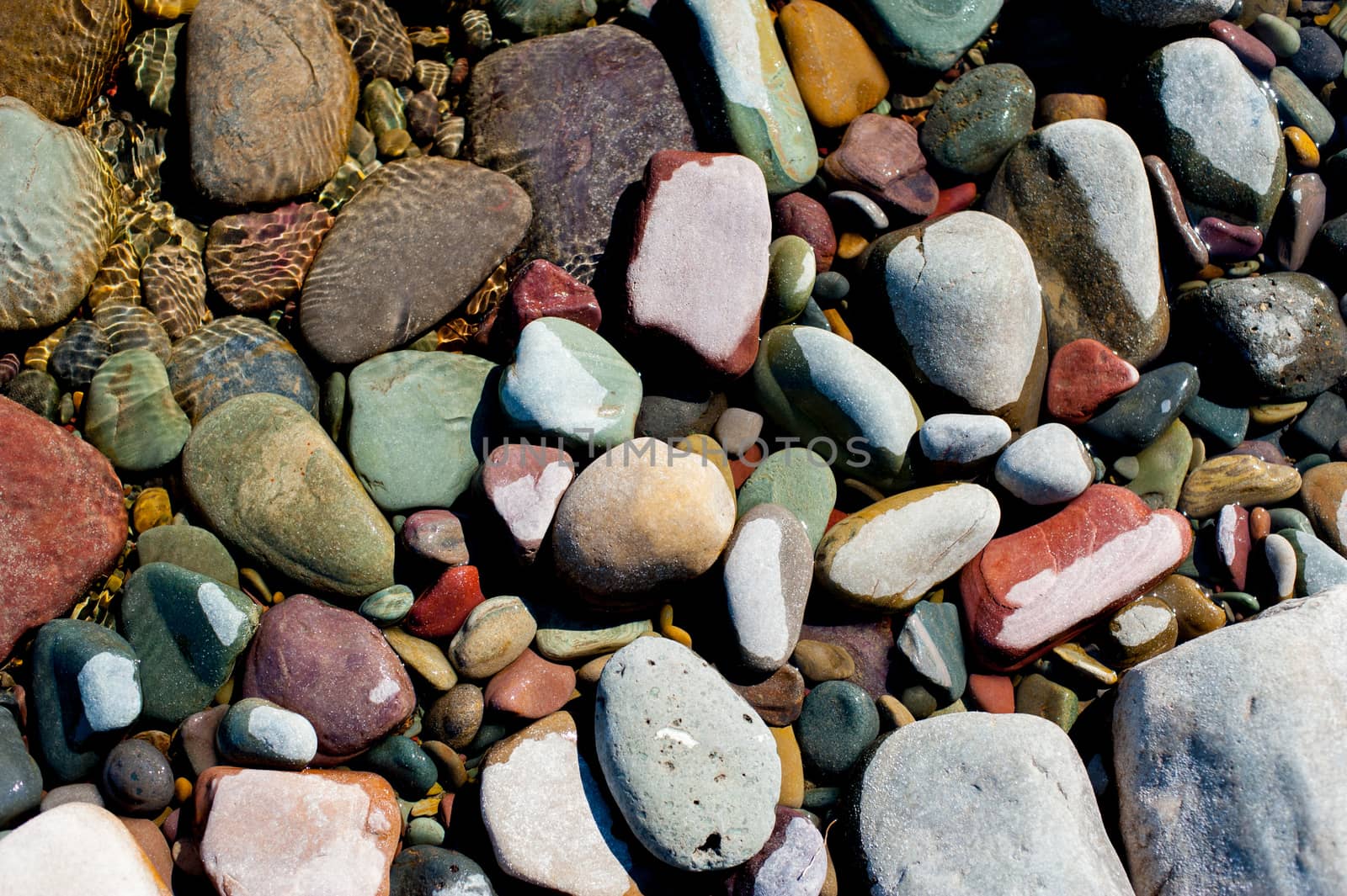 Stones at ''Yellowstone National Park'' is located in the U.S. states of Wyoming, Montana, and Idaho. This park is the first national park established in America.