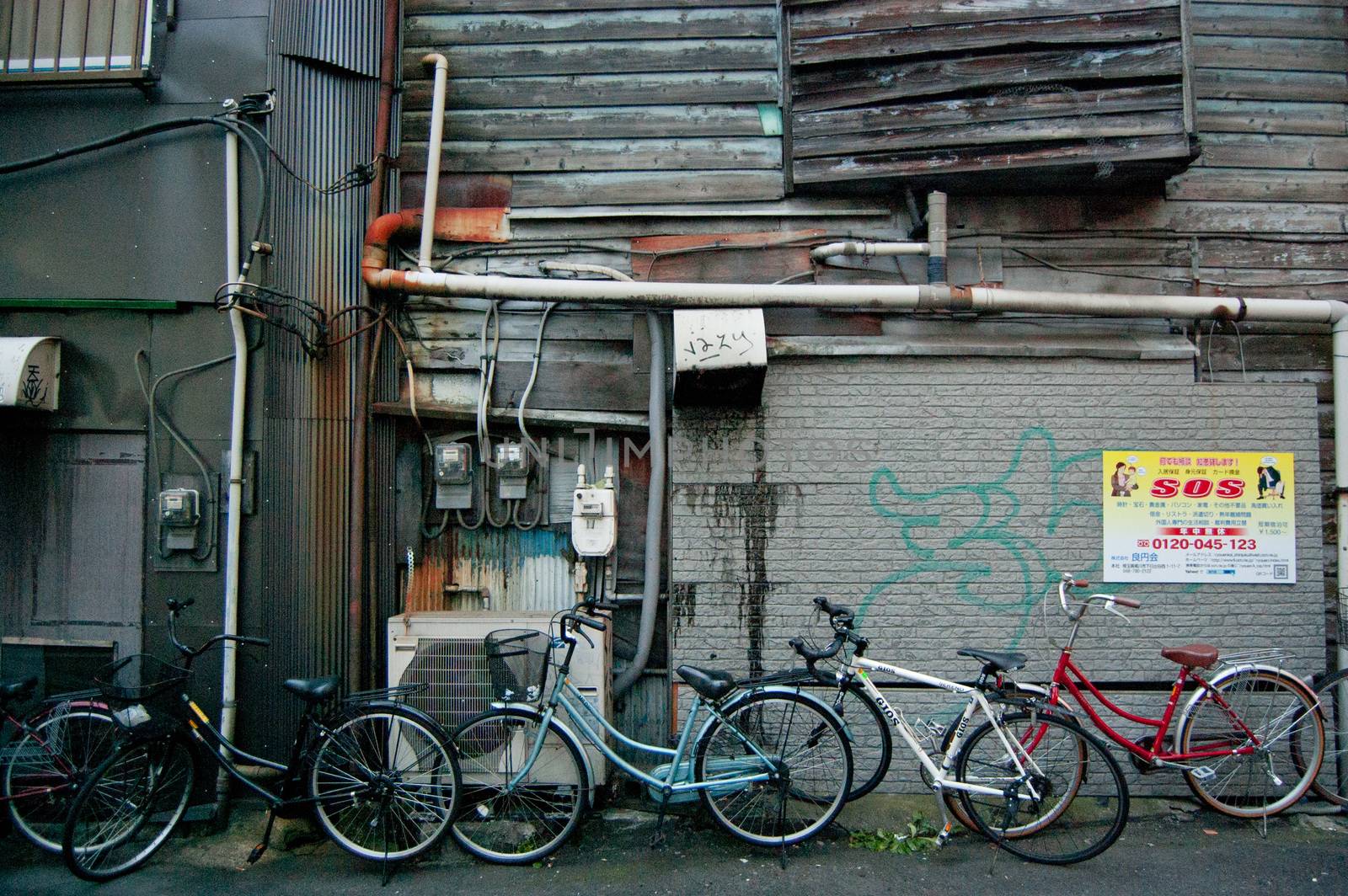 Bicycles on the street of Shinjuku, Japan. Shinjuku is a city located in Tokyo. The station is the busiest one in the world.