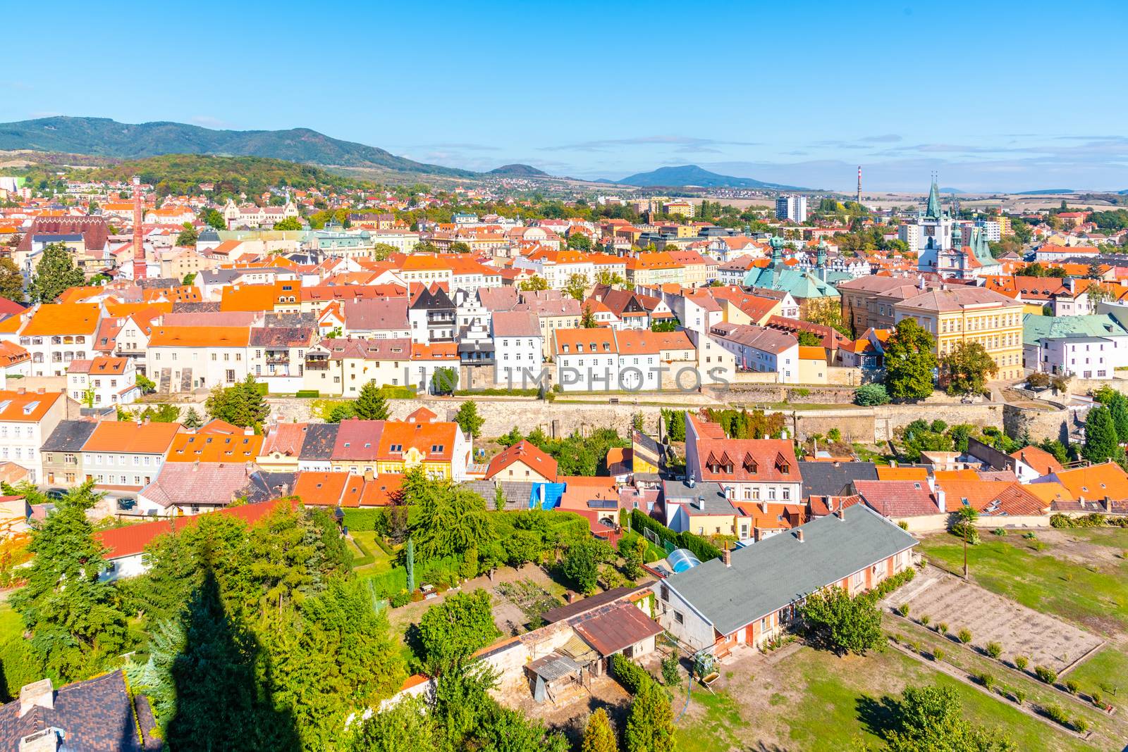 Aerial view of Litomerice from cathedral bell tower on sunny summer day, Czech Republic by pyty