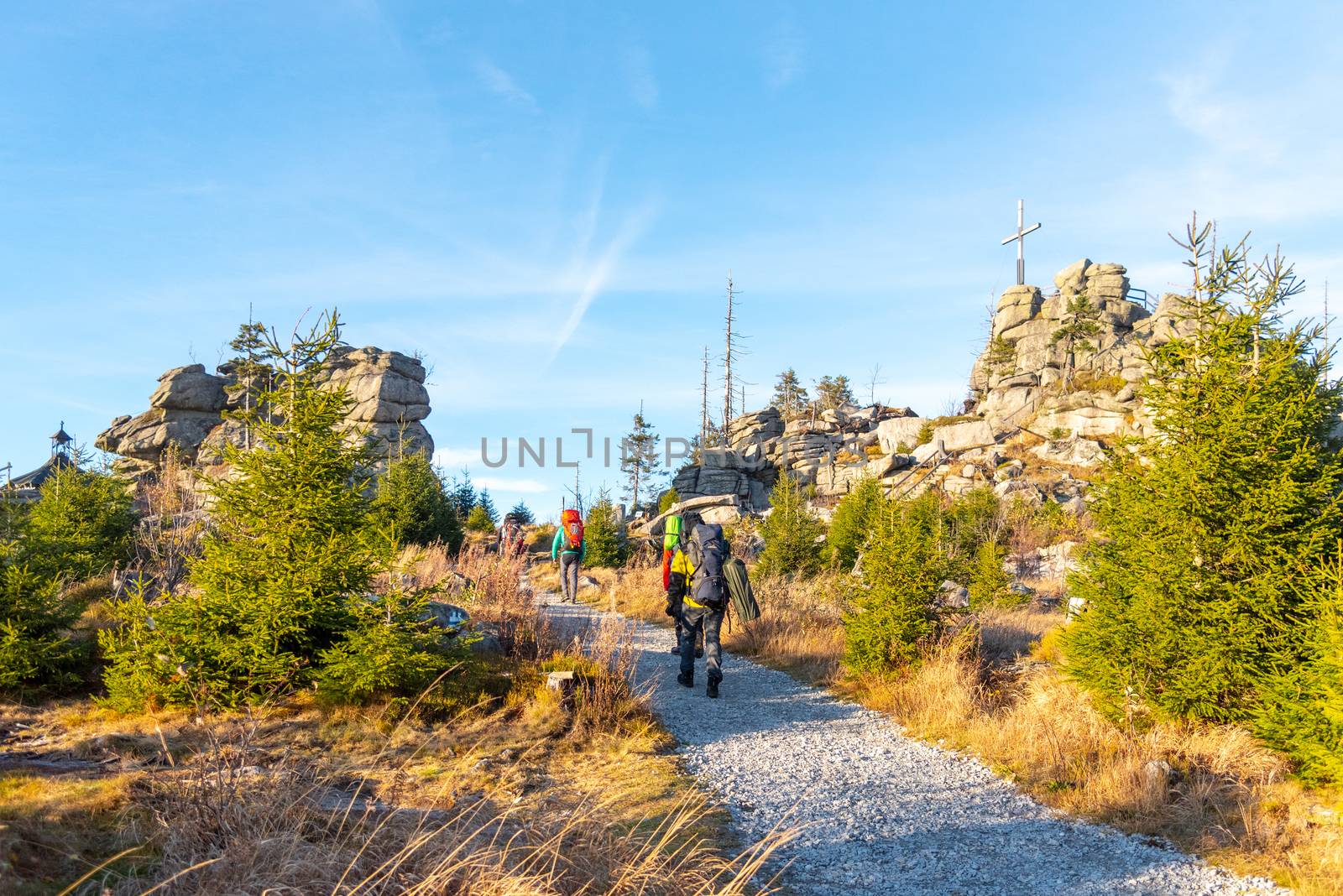 Granite rock formation with wooden cross on the top of Hochstein near Dreisesselberg, Tristolicnik. Border between Bayerische Wald in Germany and Sumava National Park in Czech Republic by pyty