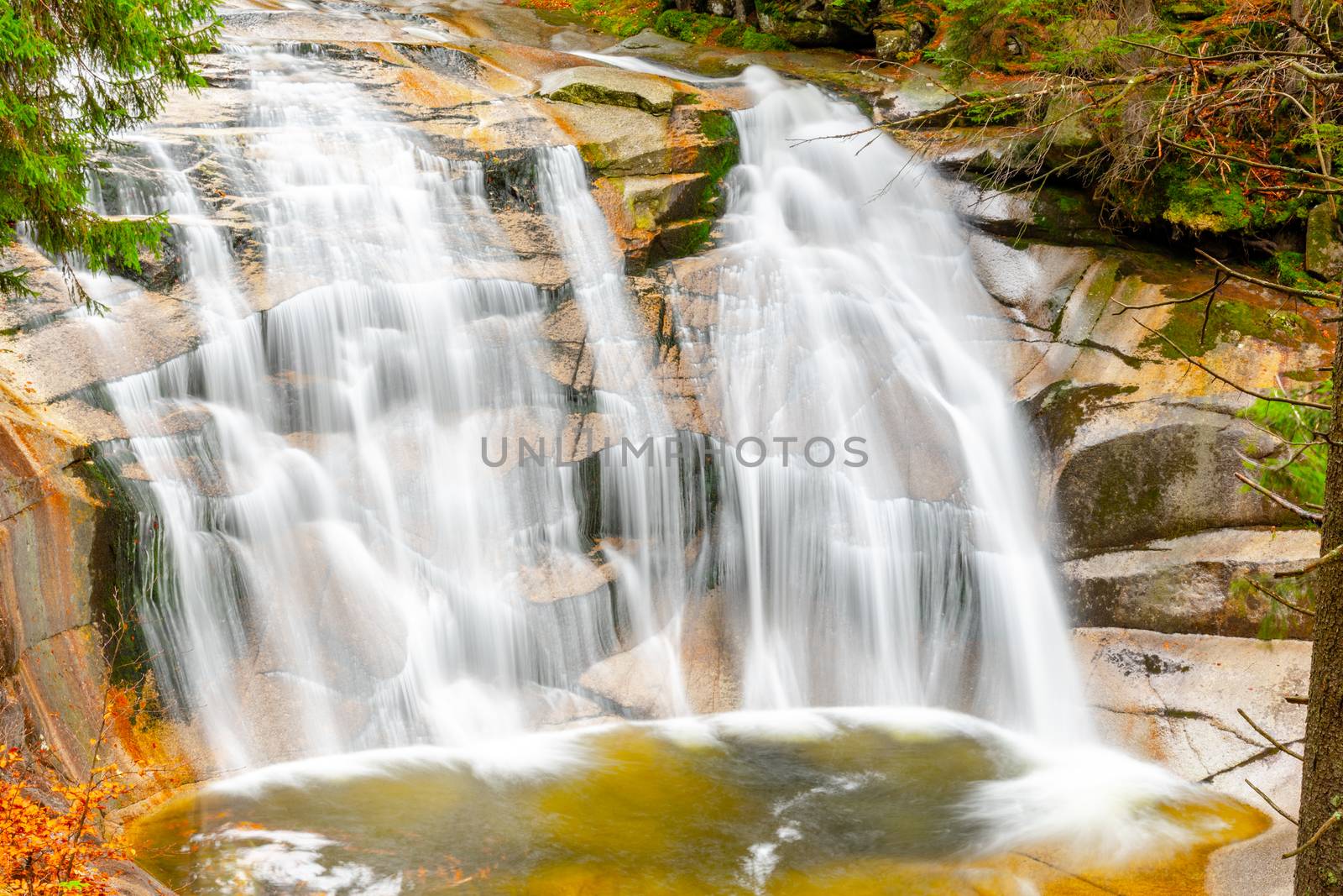 Mumlava waterfall in autumn, Harrachov, Giant Mountains, Krkonose National Park, Czech Republic. by pyty