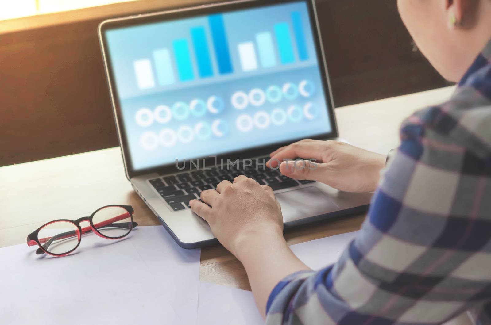 businessman using laptop computer  in office. hipster tone