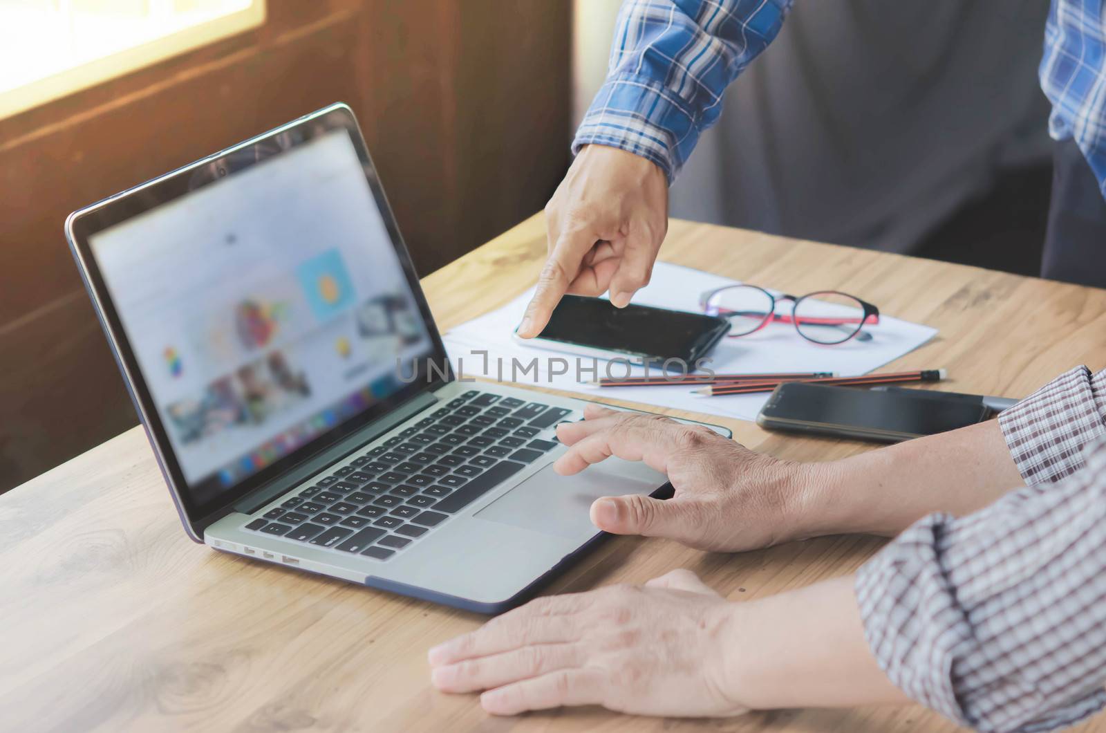 businessman using laptop computer  in office. hipster tone