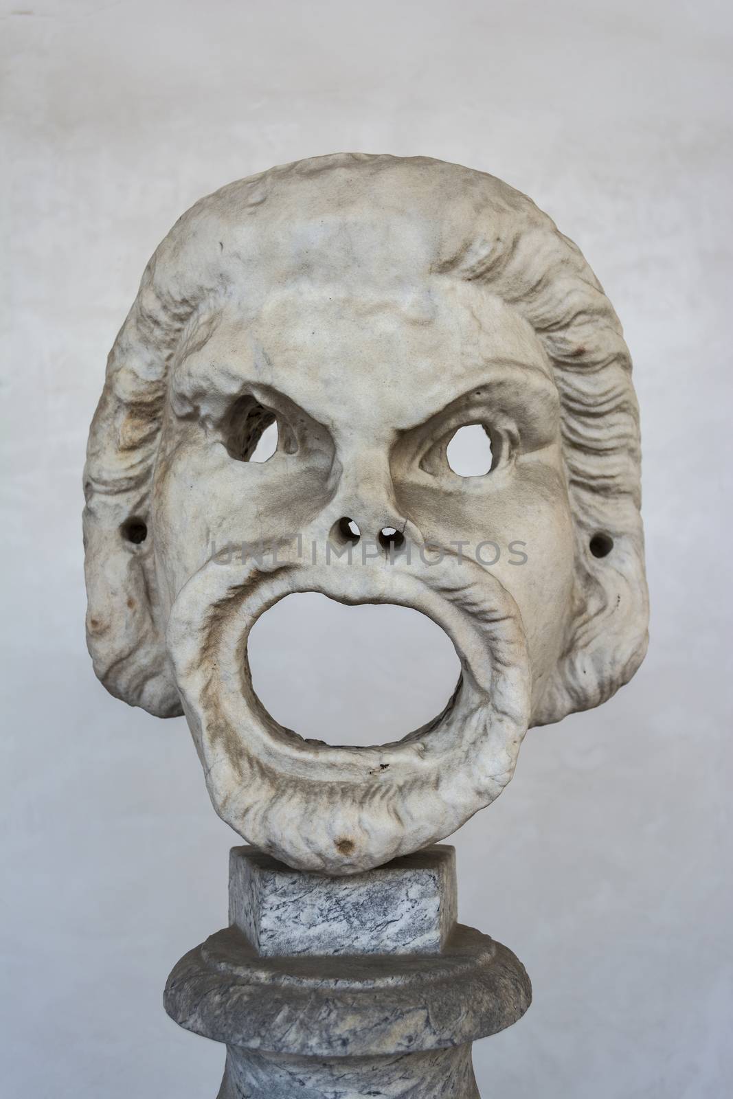 Death mask scuplture in the baths of Diocletian -Thermae Diocletiani- in Rome. Italy by ankarb