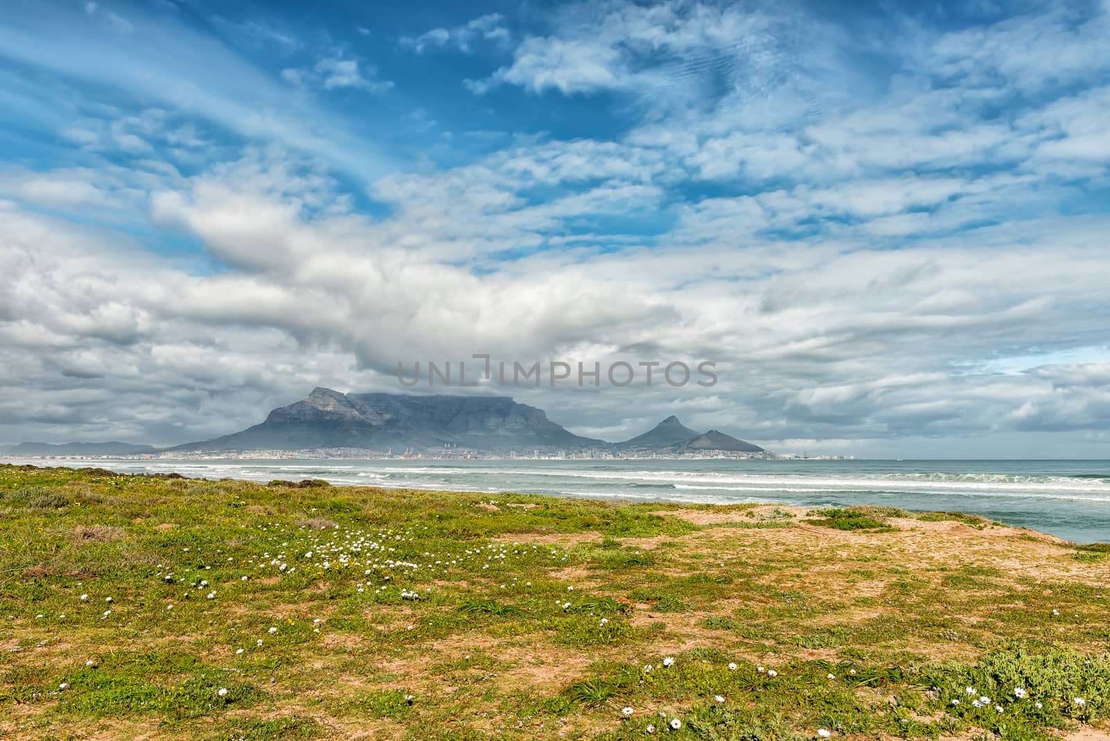 The Cape Town Central Business District and Table Mountain as seen across Table Bay from Dolphin Beach in Bloubergstrand
