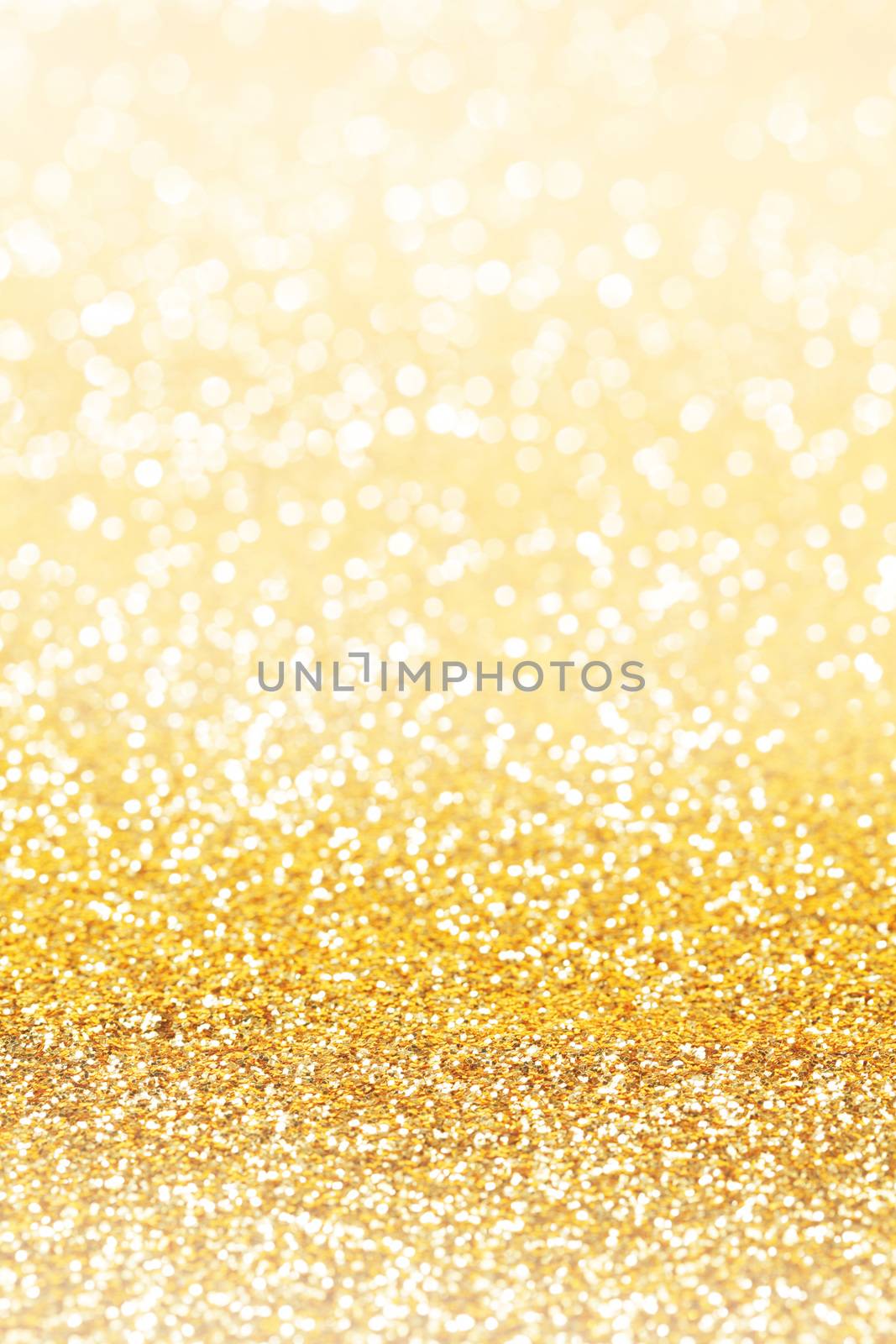 Abstract shining glitters gold holiday bokeh background
