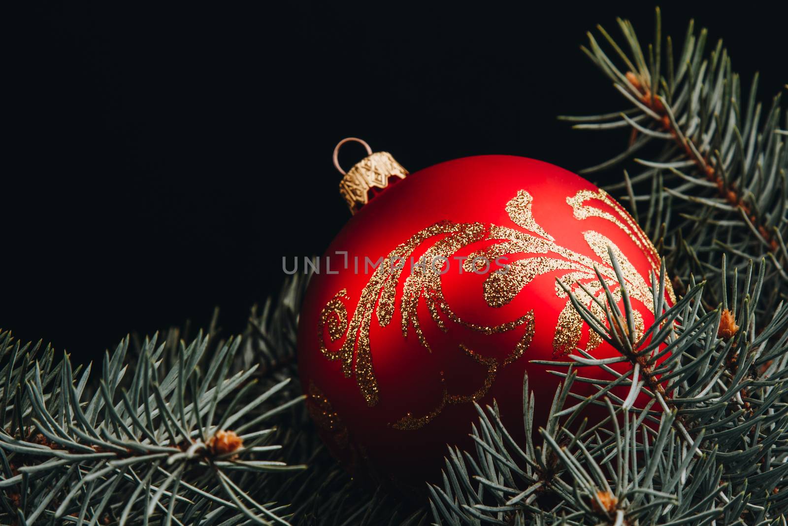 Christmas fir tree branches on wooden table. New year Christmas background with copy space. Greeting card.