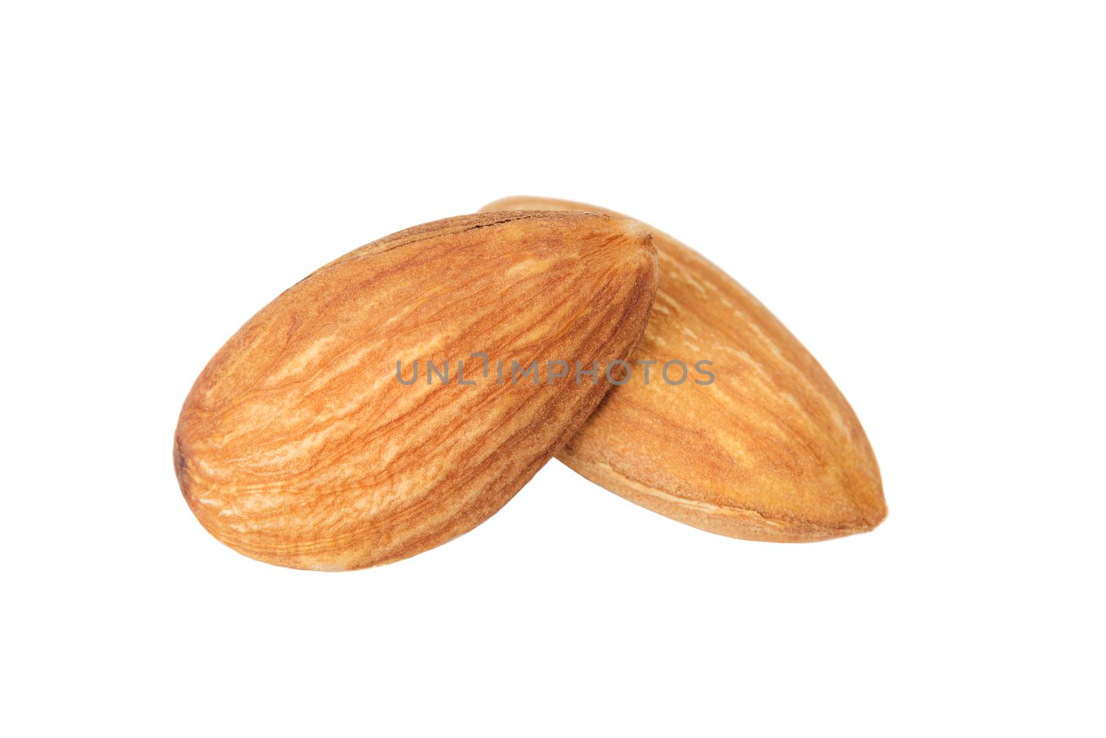 Two raw almonds isolated on a white background