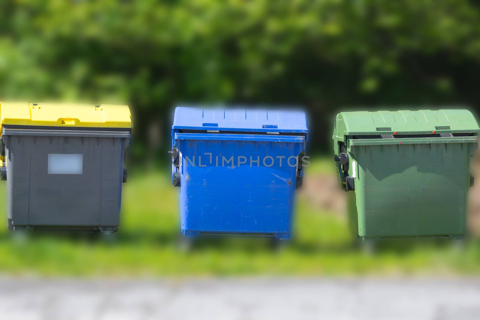 Industrial Waste Containers Dumpster for municipal and private waste or industria. Background with blur