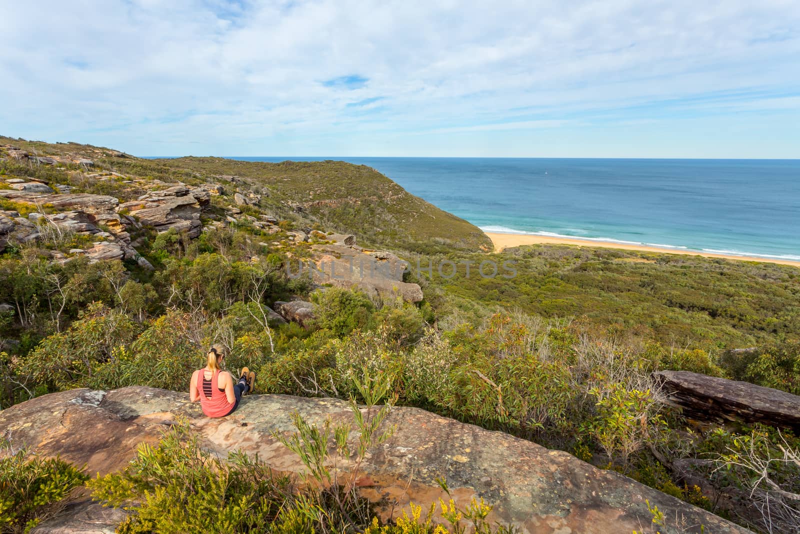 Weekend time, relaxing on a rocky ledge near the ocean by lovleah