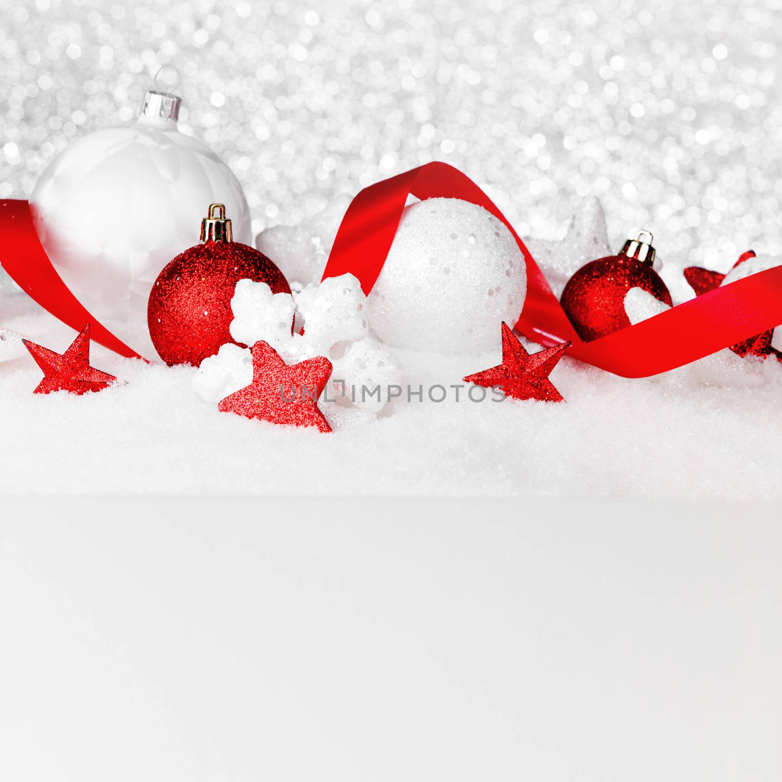 Christmas decorations in snow by Yellowj
