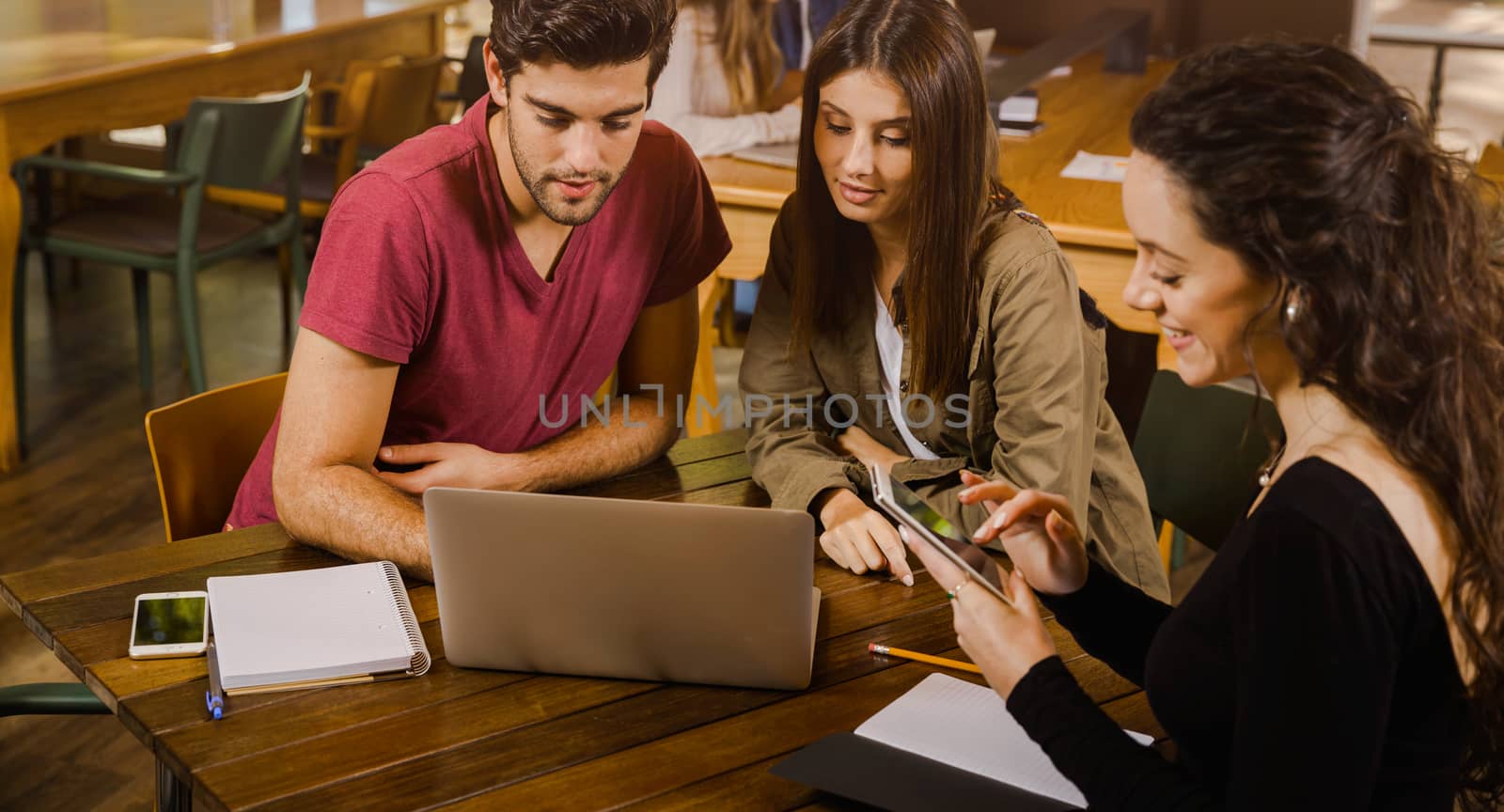 Group of friends studying together for finals