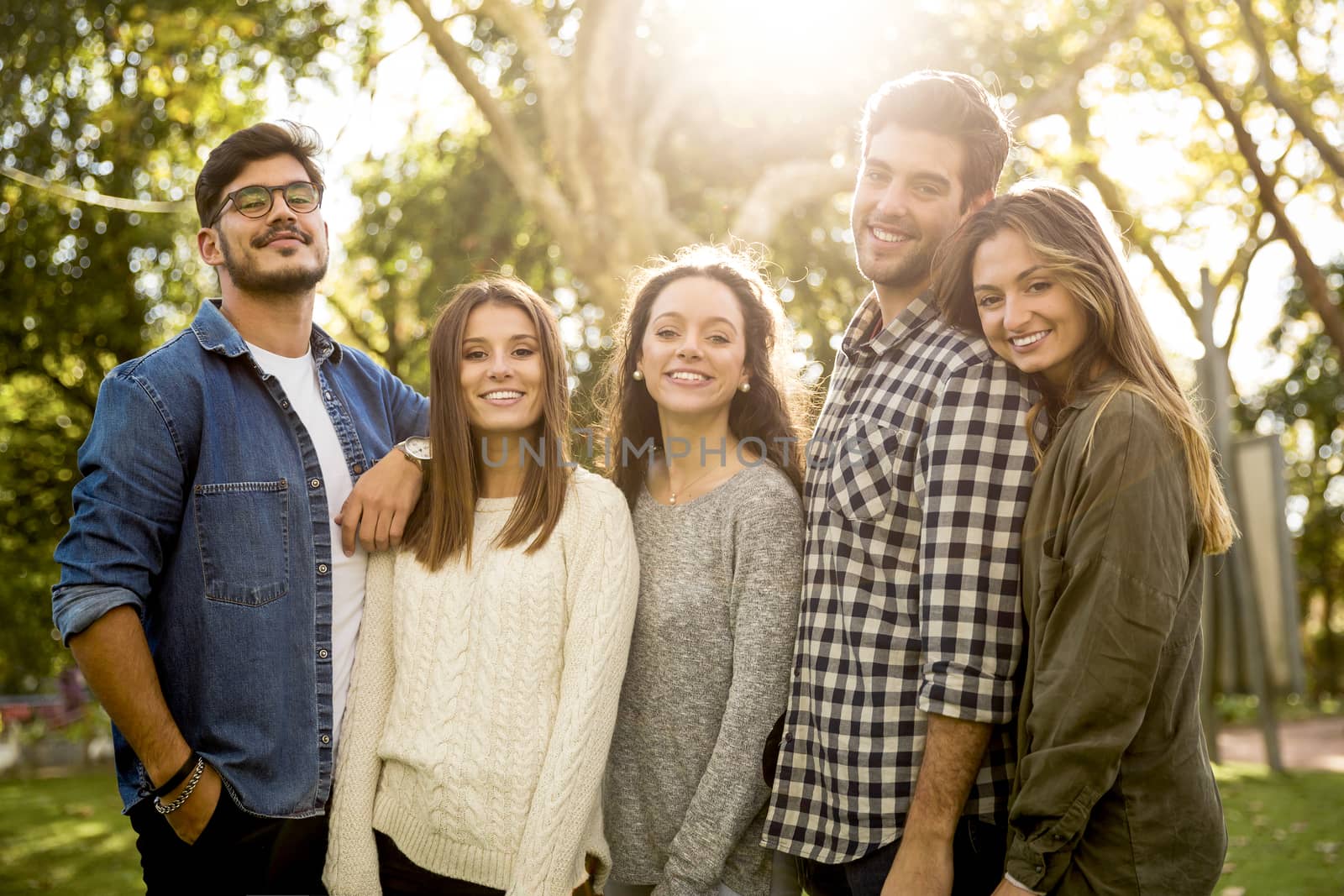 Group of friends having  a great day in the park