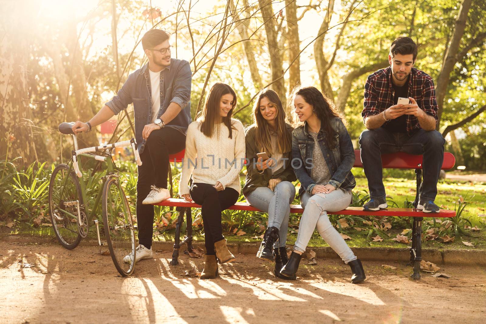 Group of students in the park having fun together