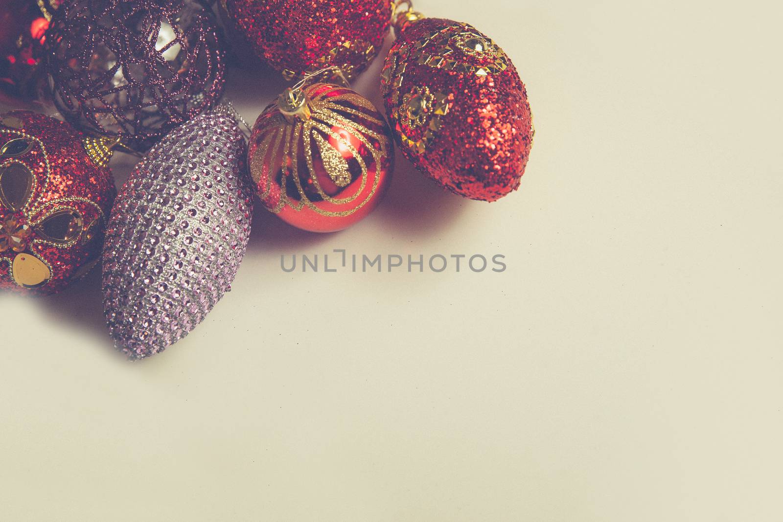 Top view of christmas decor set in red,crimson,pink and lilac colors