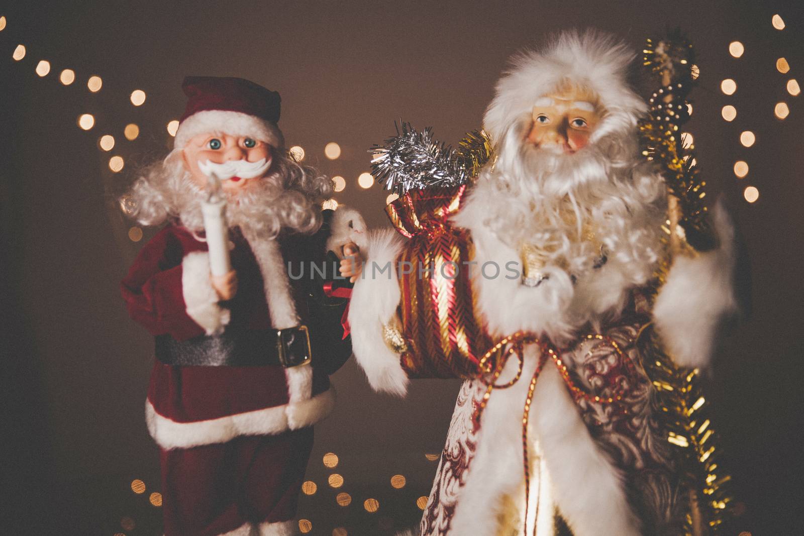 Father Frost and Santa Klaus figurines together, New Year 2019 by mi_viri