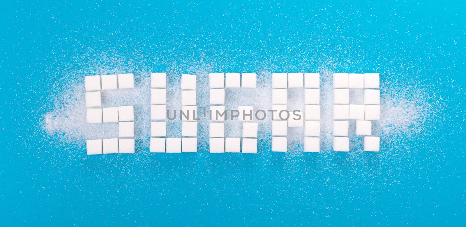 White sugar cubes background - Concept of unhealthy eating