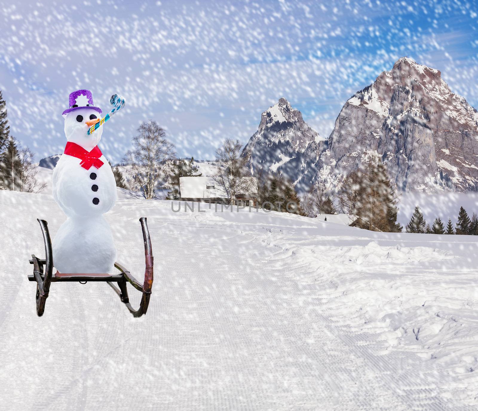 Merry christmas a funny party snowman sleighing down a ski hill slope on a sled in snowy weather by charlottebleijenberg
