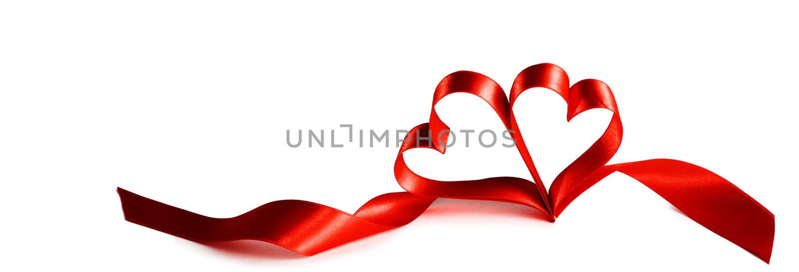 Two ribbon hearts isolated on white background