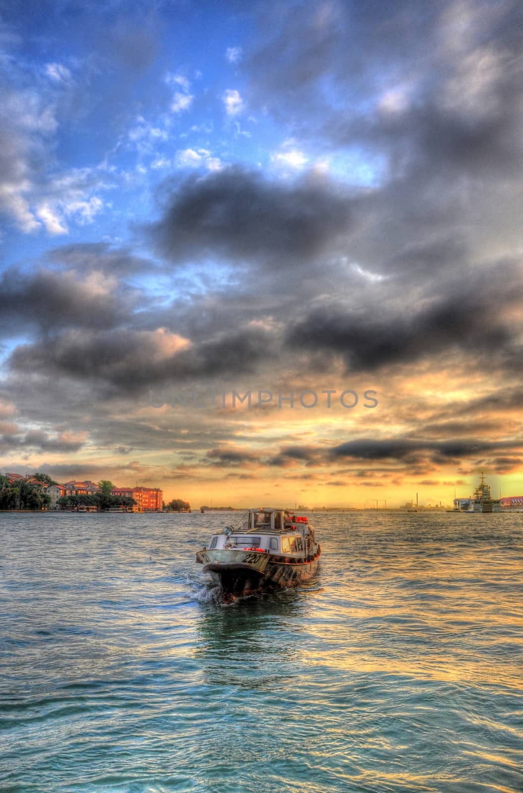 Beautiful sunset with a ship in the Mediterranean sea, Venice, Italy HDR 