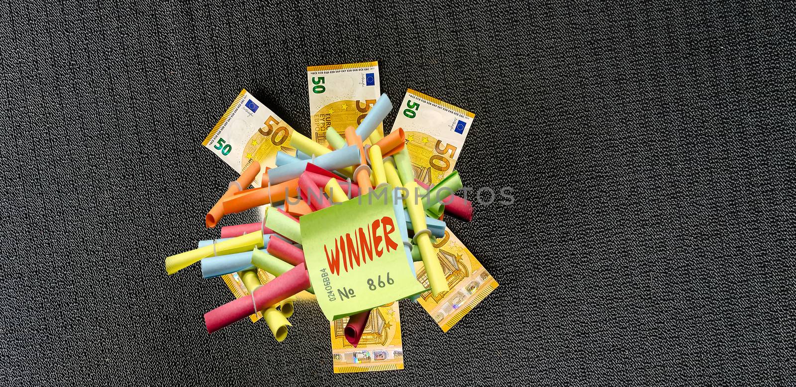 Banknotes decorated on a table. Concept lottery win and good luck.