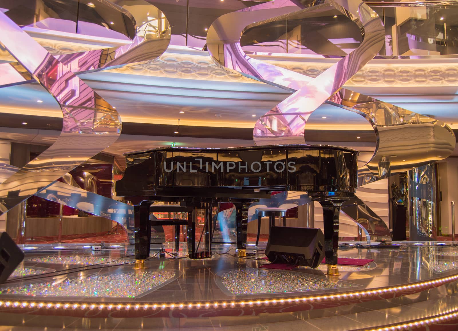 Luxury sparkling interior with Grand piano and floor with rhinestones on cruise liner MSC Meraviglia, 8 October 2018.