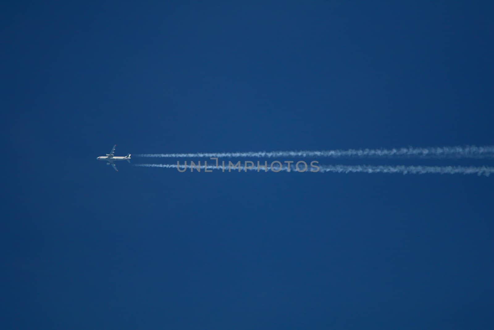 Trace of the airplane in the sky.