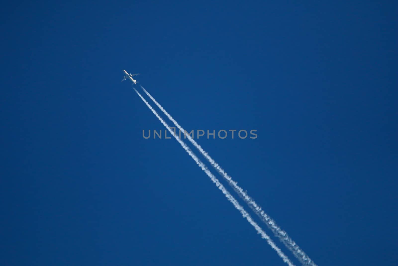 Trace of the airplane in the sky.