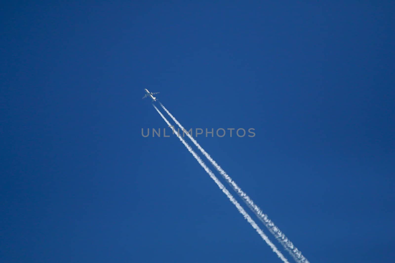 Trace of the airplane in the sky.