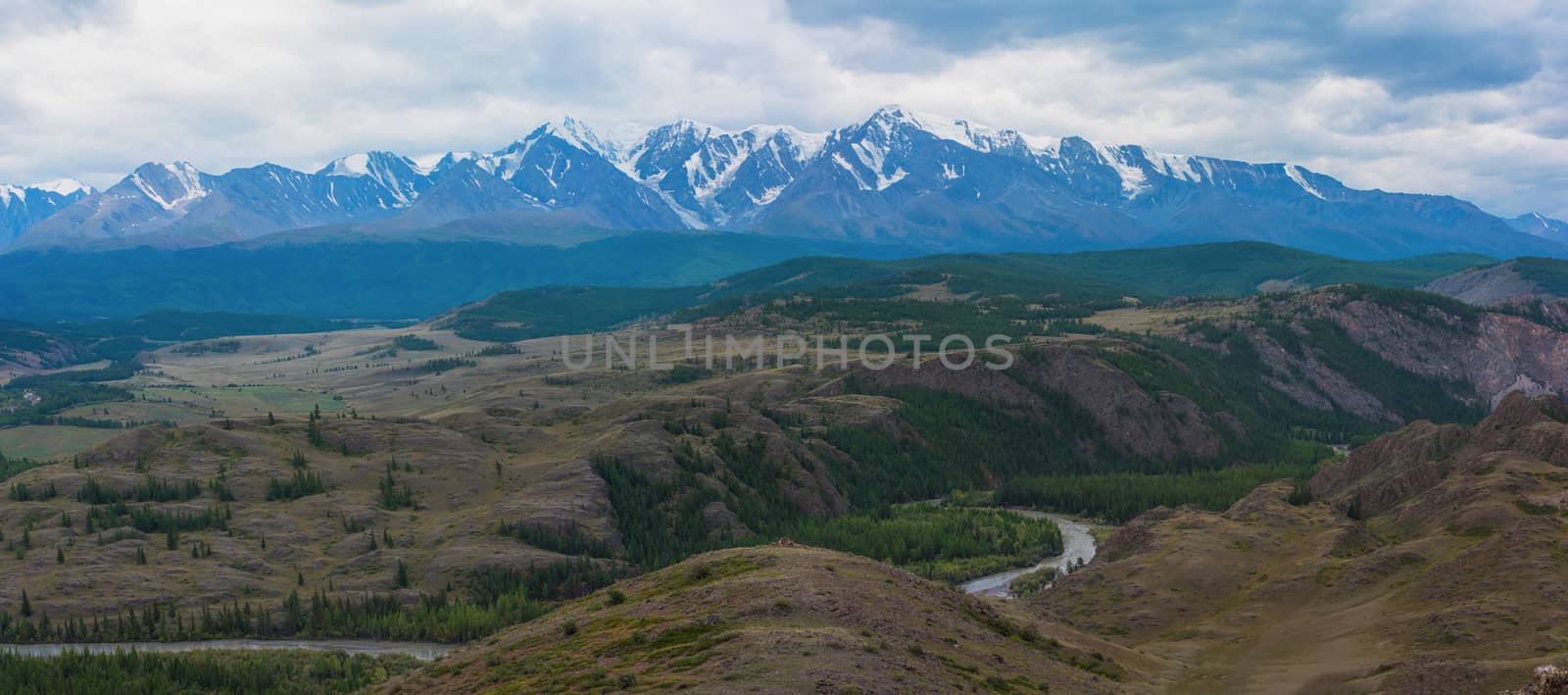 Summer in Kurai steppe and North-Chui ridge of Altai mountains, Russia. Cloud day.